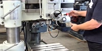 Victor-8" x 33" Victor 833 vertical milling machine, equipped with powered elevation for precision adjustments. This machine is perfect for a wide range of fabricating and chip-making applications, ensuring accuracy and efficiency. A7550-01