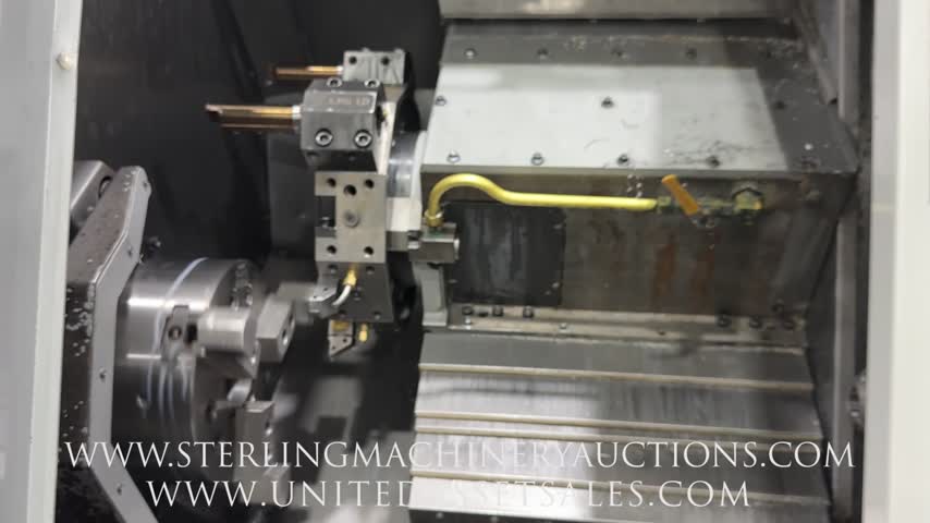 Haas-LOT-28  2005 HAAS SL-20TB TURNING CENTER, 10" CHUCK, 5C COLLET NOSE, TAILSTOCK, 10-STATION TURRET, 2.5" BAR CAPACITY, 30 HP VECTOR DRIVE, CHIP AUGER, APPROX. FEED CUTTING 7135 HOURS, S/N 71866-01