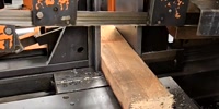 HEM-Used Hem Saw Fully Automatic Bandsaw, equipped with a hitch feed and conveyor, perfect for your cutting needs. This reliable machine, available under Sterling Machinery  #A7475-01